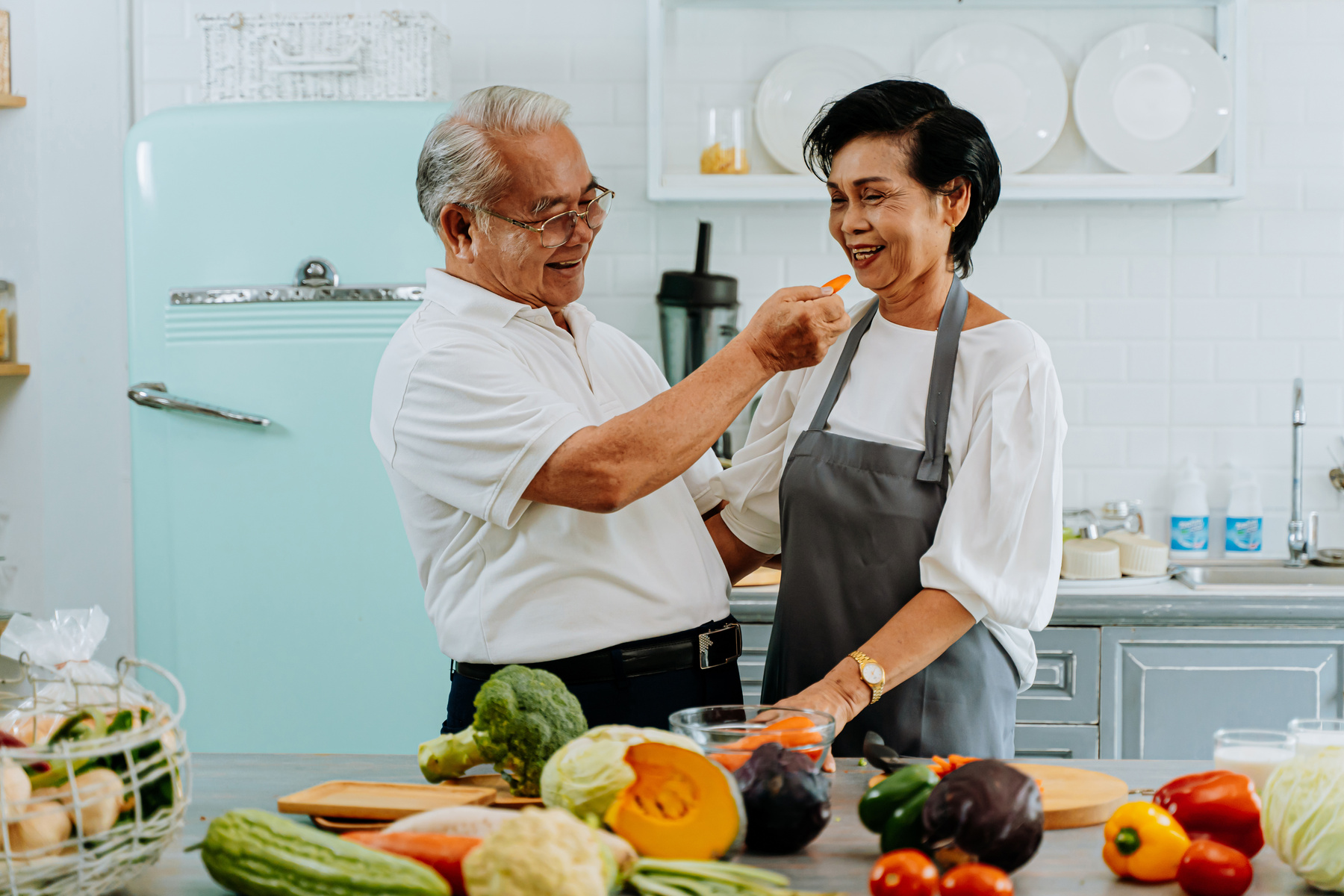 Affectionate Senior Couple in the Kitchen 